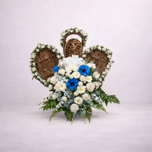Arreglo para funerales en forma de angel elegante con entrega a domicilio en Guatemala